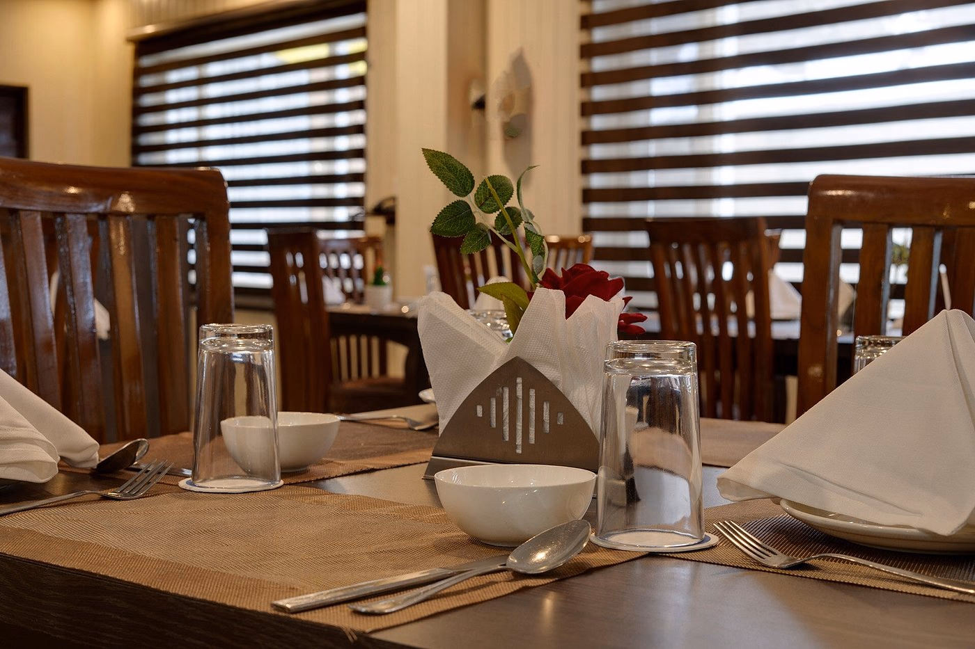 A set dining table at Hotel Sparrow's restaurant A set dining table at Hotel Sparrow's restaurant