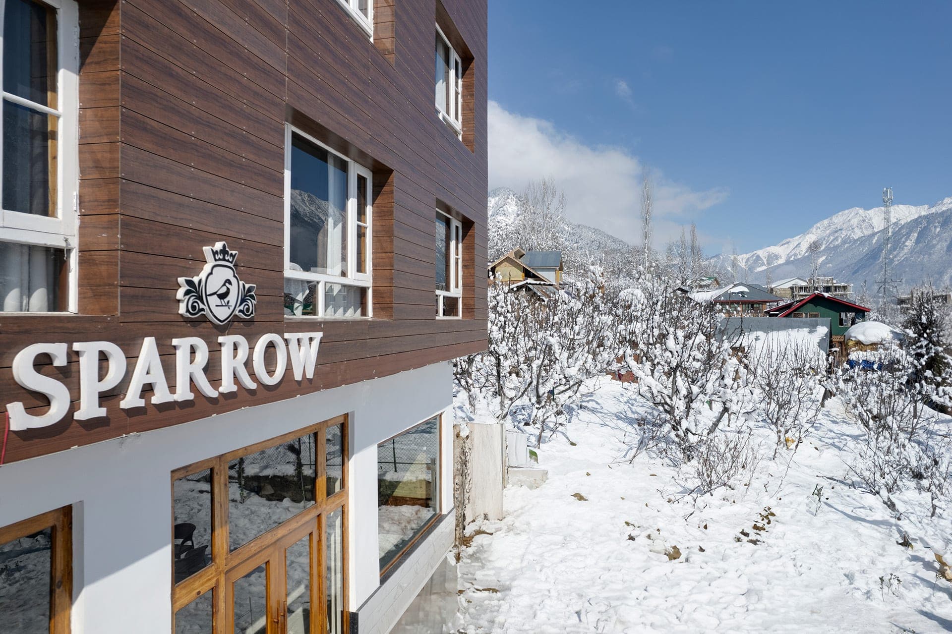 Hotel Sparrow exterior with the Pahalgam valley behind it Hotel Sparrow exterior with the Pahalgam valley behind it